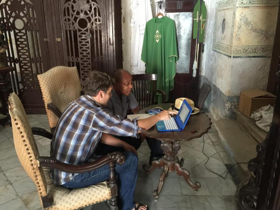 David at desk with computer