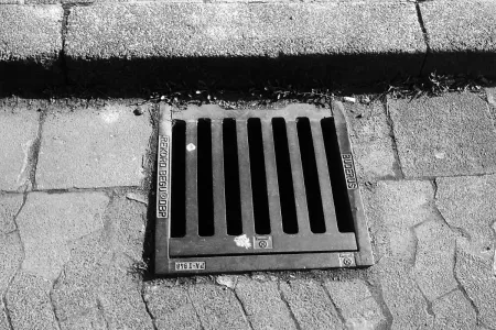 A stormwater drain on a street