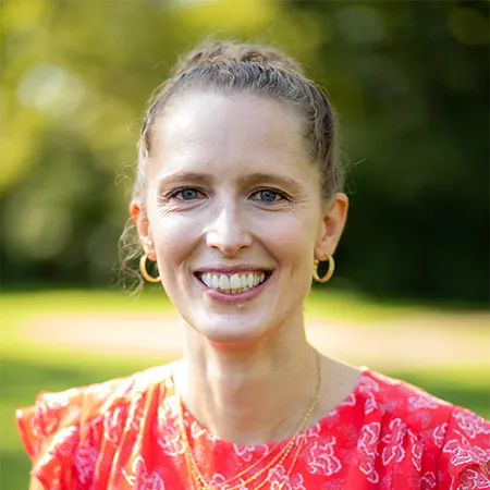 A headshot of Laura Schmitt Olabisi